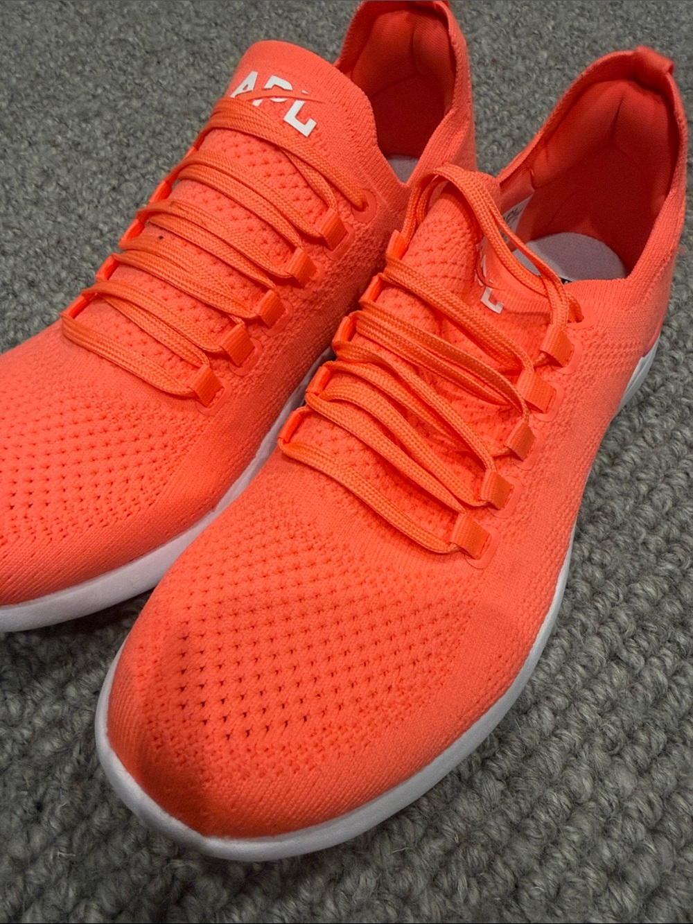 APL Women's TechLoom Knit Sneakers in Vibrant Orange